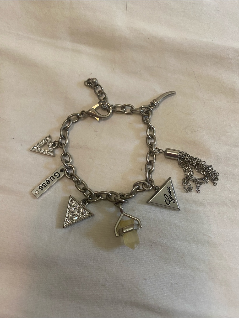 Guess Silver-Tone Charm Bracelet with Pale Yellow Stone and Crystal Triangles